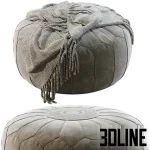 High-resolution 3D model of a vintage round Moroccan leather pouf with detailed stitching and draped knit throw blanket