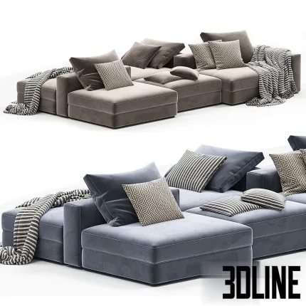 3D model of the Ananta modular sectional sofa system, featuring a versatile double-sided island configuration with green and beige fabric modules, patterned cushions, and throw blankets.