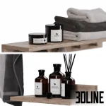 3D model set of bathroom accessories on a wooden shelf, including a stack of grey and white folded towels, Kaori branded pump bottles, body cream jars, a reed diffuser, and a scented candle.
