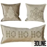3D model set of three beige velvet throw pillows decorated with gold metal studs forming a Christmas tree, a snowflake, and "HO HO HO" text.