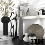 3D model of a modern decorative set featuring a black vase with tall dried grass, a wireframe body sculpture, design books, candles, and minimalist ceramic vases on a tray.