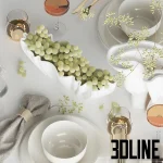 Detailed 3D model of a neutral table setting for two, including white ceramic plates and bowls, gold flatware, wine glasses, napkins, and a bowl filled with green grapes.
