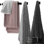 3D model set of luxury bathroom accessories including hanging and folded towels in grey and dusty pink, accompanied by white marble soap dispensers, a tray, and a reed diffuser.