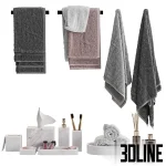 3D model set of luxury bathroom accessories including hanging and folded towels in grey and dusty pink, accompanied by white marble soap dispensers, a tray, and a reed diffuser.
