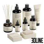 3D model of a decorative spa set featuring a large brown spherical vase with a dry branch, stacked beige towels, wooden brushes, and branded "LOVED" cosmetic pump bottles.