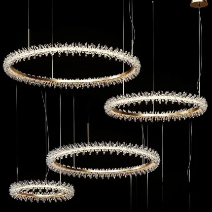 Detailed 3D model set of four THERA crystal ring chandeliers, featuring multiple gold circular frames densely covered in reflective crystal shards and integrated LED lighting.