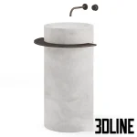 3D model of the Viola freestanding washbasin, featuring a cylindrical body made of white marble with grey veins, accented by a dark metal towel ring and wall-mounted faucet.