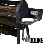 3D model of the black Weber SmokeFire outdoor pellet grill, featuring a large cooking area with food, a side digital controller showing 600°F, a side shelf, and a realistic paper bag of charcoal/pellets.