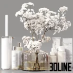 3D model of a luxury bathroom decor set featuring large glass vases with white Gypsophila flowers, branded toiletries, scented candles, a modern clock, and a white toilet brush.