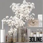 3D model of a luxury bathroom decor set featuring large glass vases with white Gypsophila flowers, branded toiletries, scented candles, a modern clock, and a white toilet brush.